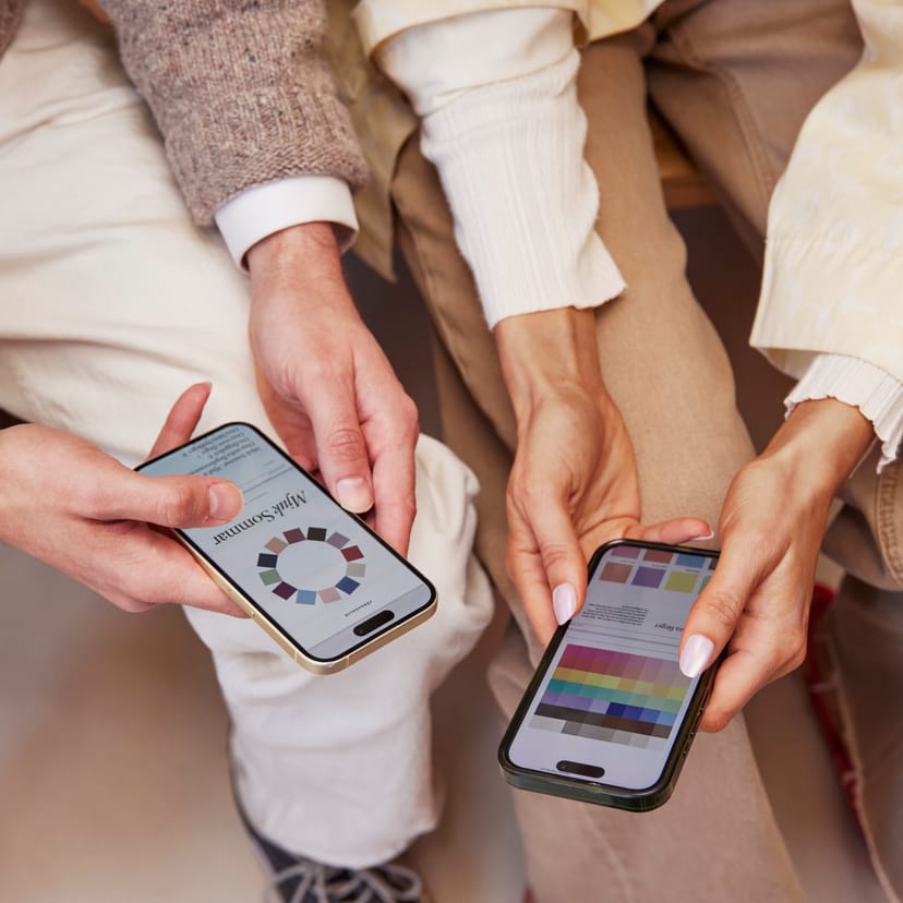 Two people comparing color palettes